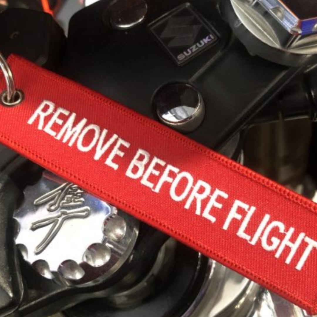 REMOVE BEFORE FLIGHT KEYCHAIN