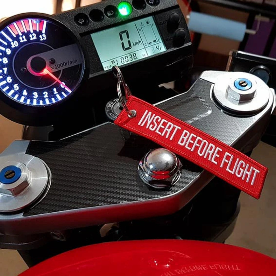 REMOVE BEFORE FLIGHT KEYCHAIN